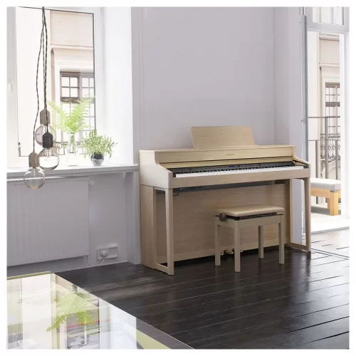 trung bay piano dien roland hp702 tai showroom viet thanh