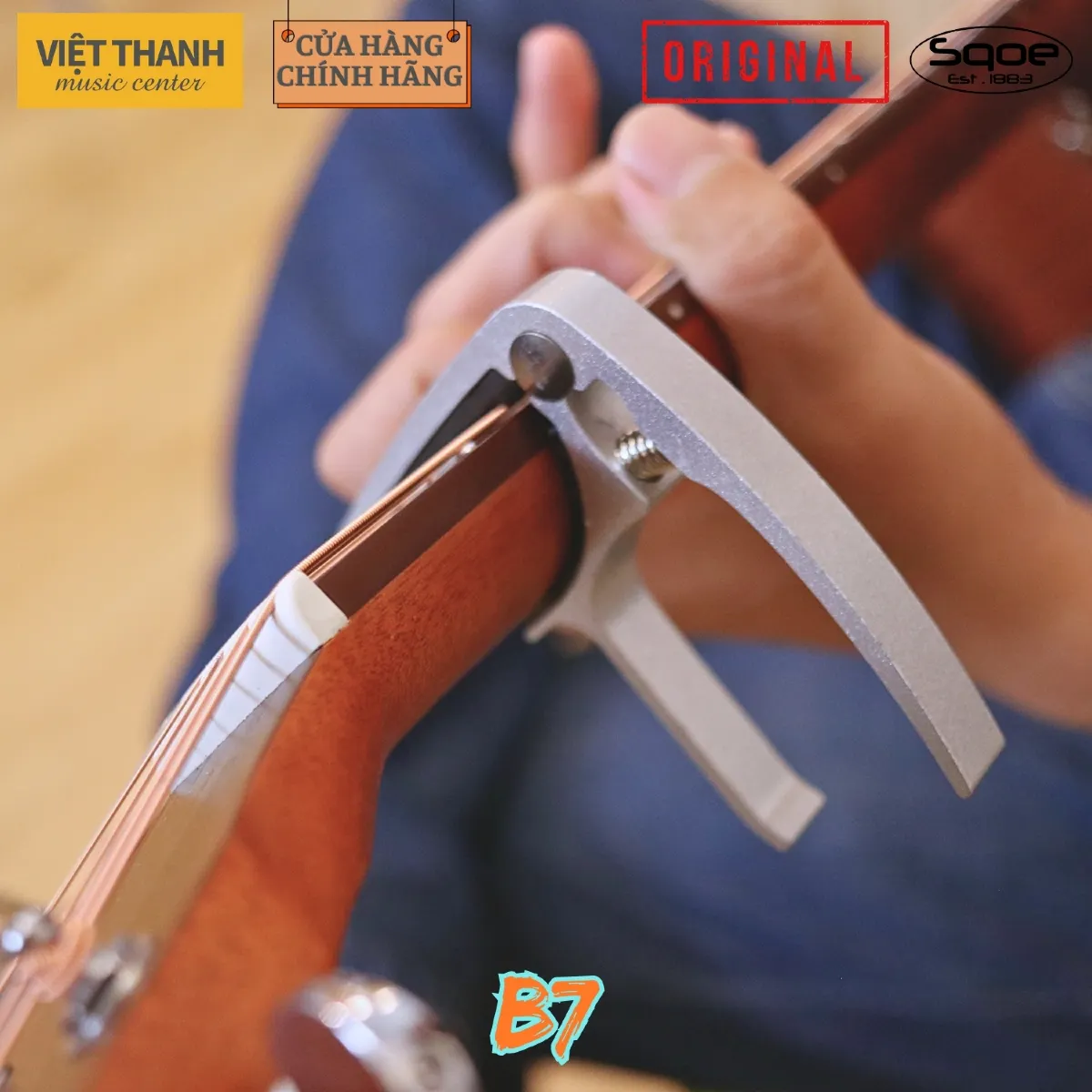 capo dan guitar sqoe b7 chinh hang