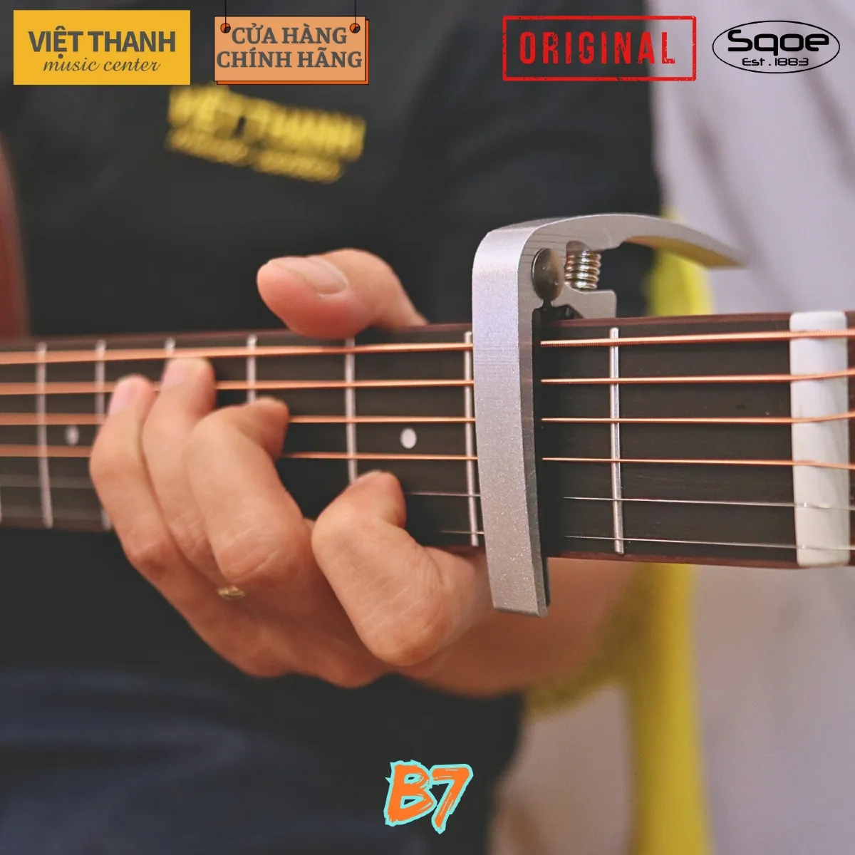 capo guitar sqoe b7 chinh hang