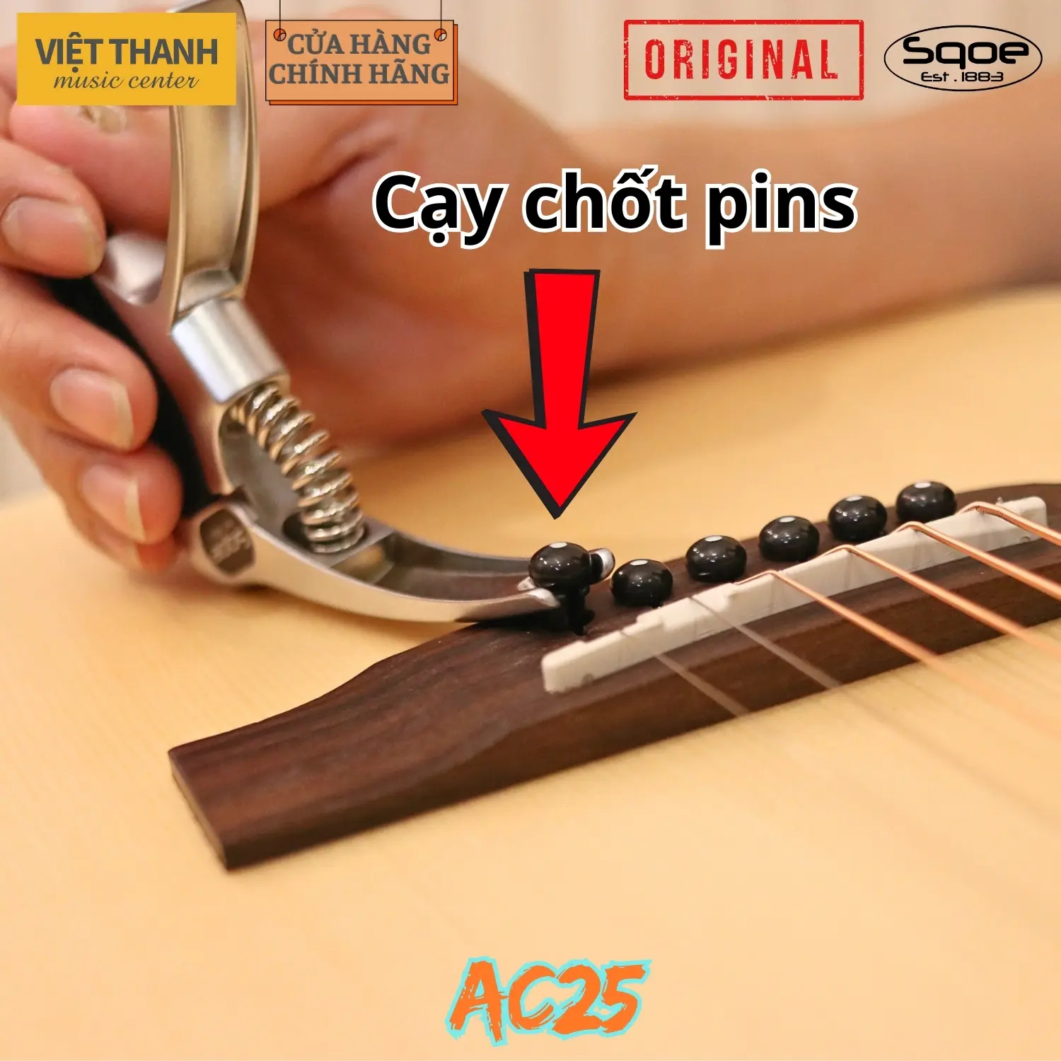 cay chot pin capo guitar sqoe ac25 3in1