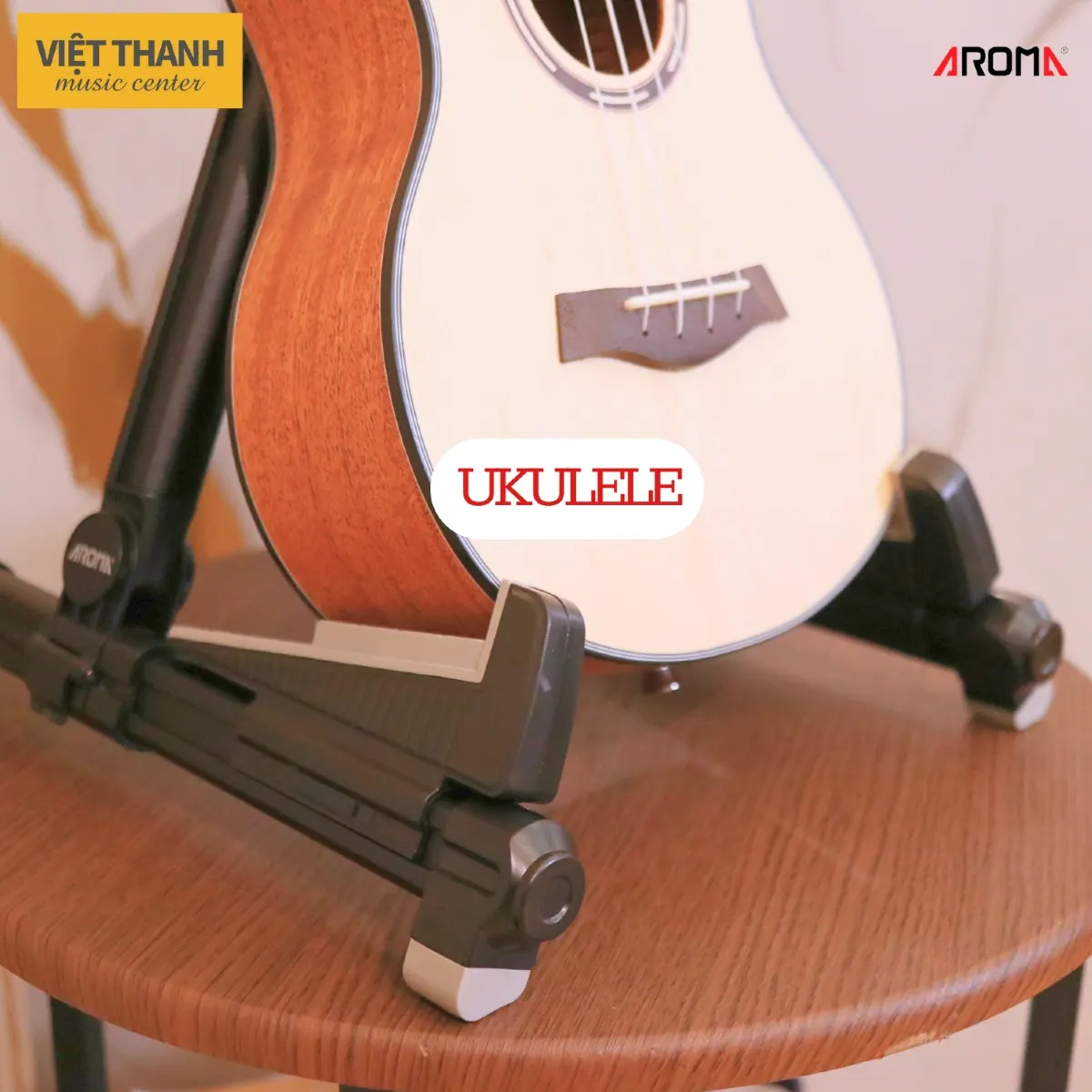 chan dan guitar aroma ags 08 cho ukulele