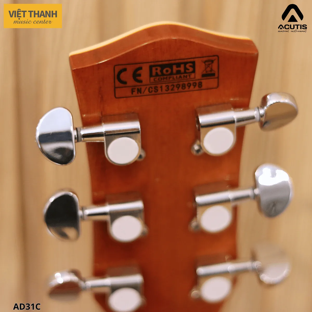 chot giu day dan guitar acutis ad31c