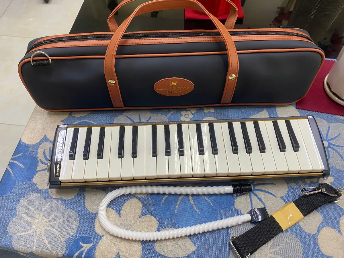 ken phim melodion suzuki m-37c