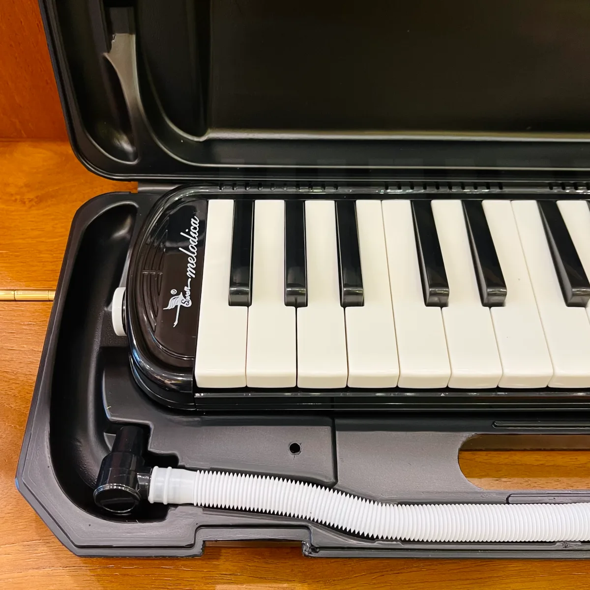 melodica swan sw32j 4 mau den