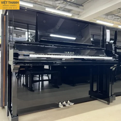 Đàn piano cơ Yamaha UX30BL cũ, màu đen bóng, khung giằng chữ X ở mặt sau